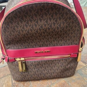 Michael Kors Brown MK Signature Backpack with Pink Trim and Gold Hardware